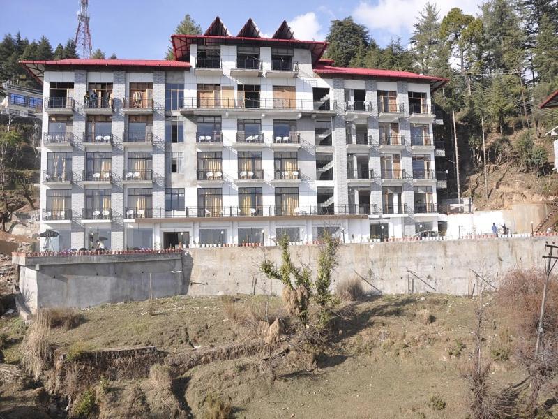 Oyo 28425 Dal Lake Resort 다람샬라 외부 사진